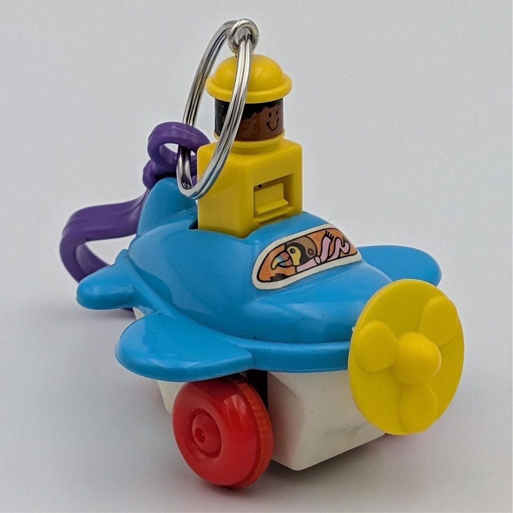 VTG 1982 Tomy Airplane Keychain Push and Go Plastic Propeller Plane Bag Charm